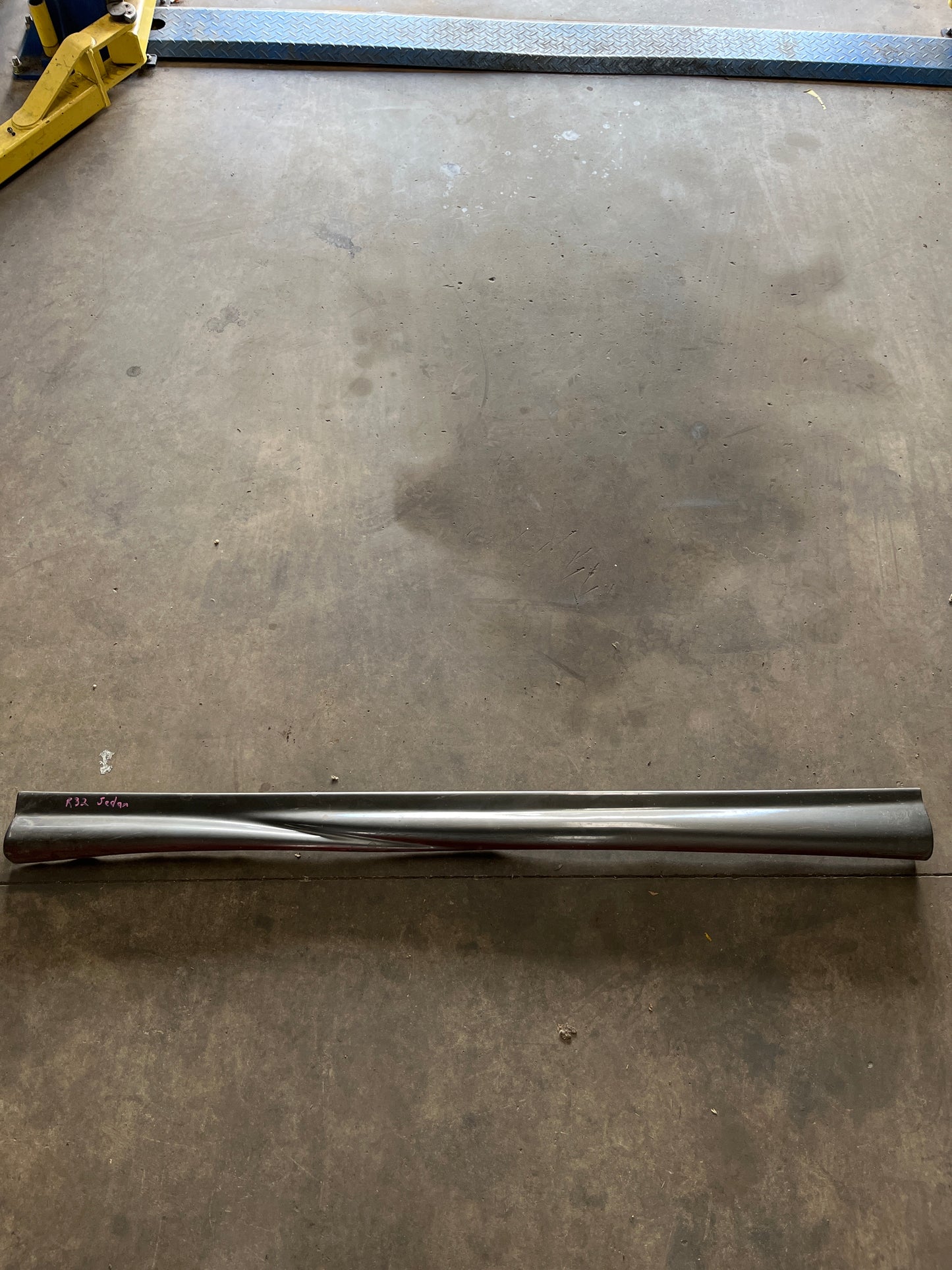 Aftermarket R32 Sedan Fibreglass Side Skirt Passenger Side