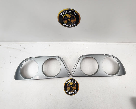 Good Condition R33 Coupe Tail Light Shroud Pair Silver