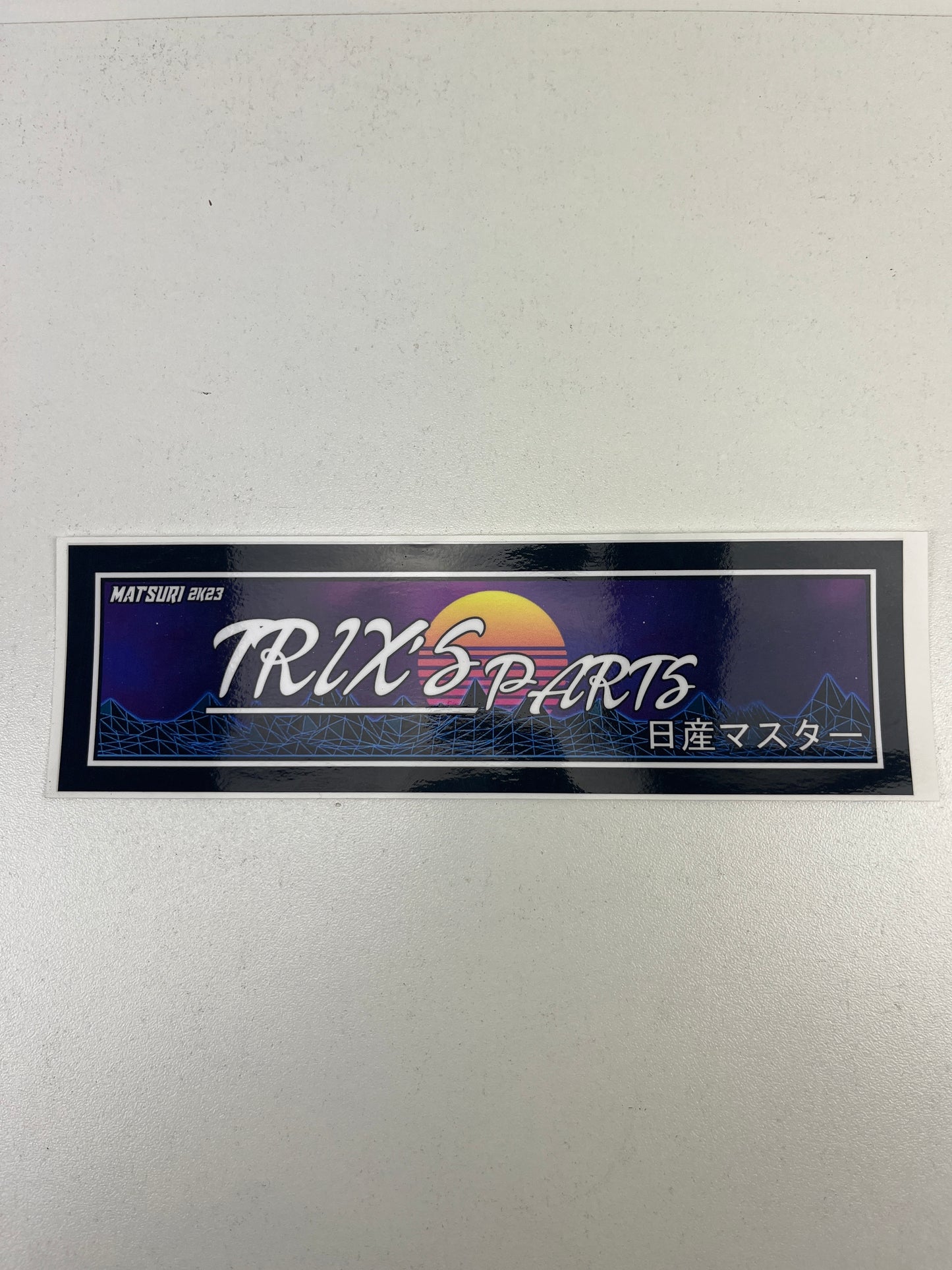 Trix's Parts "Matsuri 2K23" Nissan Master Sticker Rectangle. Size 19.5cm x 5.5cm